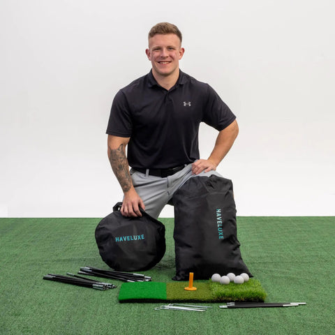 Man with Massive 10x7ft Golf Practice Net Kit With Hitting Net Chipping Net Tri Turf Mat And Target Mat for backyard training
