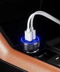 Grab And Go Dual USB Car Charger With Fast Charge Ports Solid Cigarette Lighter Adapter plugged into car console with cables.