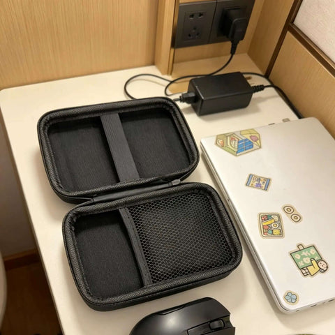 Hassle Free Waterproof Cable Organizer Pouch With Plush Velvet Interior keeps your gear secure and scratch free on desk.