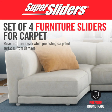 Slide Heavy Items With No Struggle Peel And Stick Floor Savers Round Furniture Sliders For Carpet Gliding Smoothly Over Area Rugs Zero Hassle When Shifting Couches Or Dressers In Warm Tan Shade Pack Of Four displayed with a modern couch and decorative pillow.