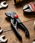 4-Inch Carbon Steel Grooved Adjustable Plumbing Pliers With Quick Jaw Adjustment, Rust-Resistant Electroplated Finish, Your Go-To Tool For Pipe Repairs, Home Fixes, And Auto Maintenance on wooden workbench