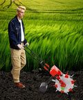 Walk Behind Garden Seeder With Six Nozzles Handy Manual Push Planter in use on rich garden soil with green crops.