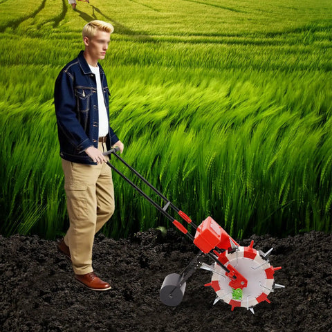Walk Behind Garden Seeder With Six Nozzles Handy Manual Push Planter in use on rich garden soil with green crops.