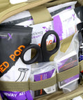 Interior of Rip Away Officer's Patrol Tactical Gunshot And Trauma IFAK Kit With Headrest Mount Desert Tan with medical supplies