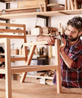 Craftsman adjusting wooden chair frame in workshop using Tough As Nails M12 T Nuts, 12 Pc Zinc Plated Steel Four Prong Blinds.