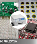 Pro Grade Automatic Reflow Soldering Machine With Hot Air Circulation Drawer Type Soldering Area And Wide Workspace, Rework Station For PCB SMT SMD BGA, Fully Auto Microcomputer Control 962A surrounded by circuit boards and electronic components.
