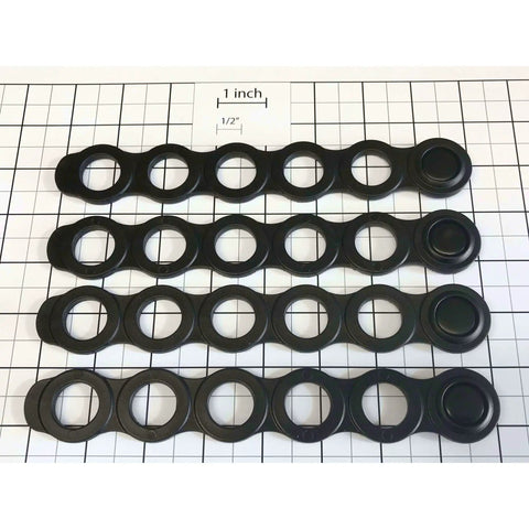 Rubber Bike Rack Straps Four Pack For Universal Car Racks Heavy Duty Three Quarter Inch Hole Straps Black on grid background