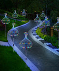 Pathway illuminated by Six Pack Solar Firework Garden Lights With Remote 120 LED Copper Wire Decor Eight Lighting Modes Waterproof