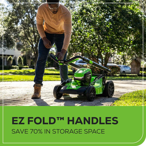 Man using 40V 20 Inch Brushless Cordless Lawn Mower With 4Ah Battery And Charger, foldable handles showing compact design
