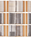 Open books showing organized Two Book SMT Components Kit With 9100 Pieces Including 0805 Resistors And Capacitors Transistors Diodes MOSFETs.