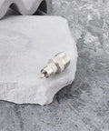 UHF SO239 Female To RCA Male Coax Connector Adapter on a stone surface for Ham Radios and Heathkit Gear