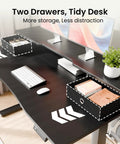 Top Shelf Electric Standing Desk 55x26 Inch with dual monitor shelf, two drawers, and keyboard, ideal for home office.