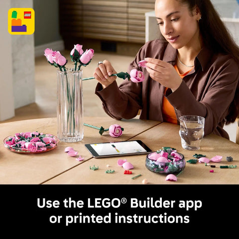 Botanicals Pink Rose Bouquet Buildable Flowers Set For Adults 18 Plus Gift For Her Home Office Decor Shelf Or Room Display Cool DIY Flower Arrangement 10374, woman assembling pink LEGO roses