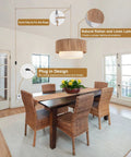 18 Inch Plug In Rattan Pendant Light With Premium Linen Shade Boho Ceiling Chandelier above a dining table in a bright room.