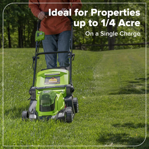 Man using 48V Two-Battery Cordless 17-Inch Push Lawn Mower With Two 4.0Ah Batteries And Dual Port Rapid Charger on grass