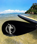 Legit Three Piece Adjustable Stand Up Paddle Board Gear With Durable Composite Blade And Secure Carry Pouch on water.