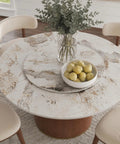 Built Different 53 Inch Round Dining Table Featuring Removable Lazy Susan Gold Ring Faux Marble Top with bowl of lemons.