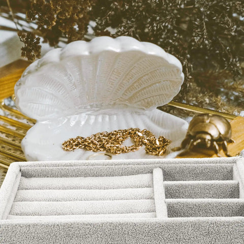 Keep Your Daily Bling Neatly Stashed In This Slick Gray Velvet Jewelry Organizer Tray With Elastic Grid For Rings Earrings Necklaces Watches Glasses Totally Solid For Home Or Store Display with gold chain and shell decor.