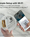 Smart Smoke And Carbon Monoxide Detector With Ring App Real Time Alerts Wire Free Interconnect AA Battery Powered Doubles Detection For Smoke And CO Real Time Notifications No Subscription Required Faster Smoke Detection More Than 25 Percent showing setup with smartphone scanning QR code