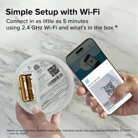 Smart Smoke And Carbon Monoxide Detector With Ring App Real Time Alerts Wire Free Interconnect AA Battery Powered Doubles Detection For Smoke And CO Real Time Notifications No Subscription Required Faster Smoke Detection More Than 25 Percent showing setup with smartphone scanning QR code