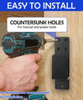 Installing Heavy Duty Door Barricade Brackets Set For 2x4 Lumber U Shaped Gate Holder with power drill on wooden door frame