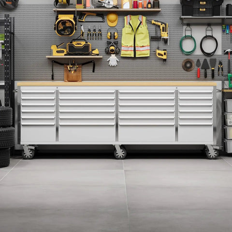 96 Inch Rolling Tool Chest With 24 Drawers, Solid Rubber Wood Work Surface, Locking Wheels And Keyed Lock, Silver shown in garage setup