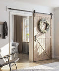 8 Foot Sliding Barn Door Hardware Kit With Track And Pull Handle Set visible in modern living room installation for 42-48 inch doors.