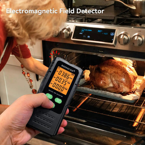 3 In 1 EMF Detector For Home And Office Use With Tri Color LCD And Audible Alerts Detects AC Magnetic Electric And Microwave EMF Fields Near Smart Meters And Cell Towers. Handheld black meter near oven