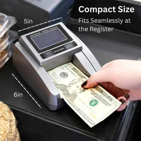 Effortlessly Verify Legit Greenbacks On The Go With This Hella Fast Portable Counterfeit Detector Machine Scanning Five Key Security Features For Sketchy Bills In One Second Flat, scanning a $20 bill.