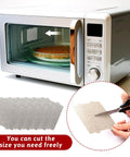 Six Pack Microwave Waveguide Covers Mica Sheets For Oven Protection, showing sheets being trimmed and installed in microwave