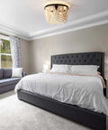 Farmhouse Boho Flush Mount Ceiling Light Three Light Wood Bead Chandelier Black Metal Hanging Pendant in cozy bedroom setting.