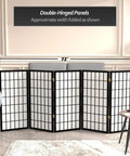 Compact 3 Foot Short Window Pane Shoji Screen Black 5 Panel Room Divider With Rice Paper Panels And Lightweight Spruce Frame For Easy Movement Privacy And Subtle Light Diffusion displayed in a living room setting.