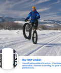 Cyclist with Fat Tire 26x4.0 Inch MTB Air Suspension Fork on snow, showcasing balance and performance.