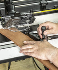 Heavy Duty Portable Benchtop Router Table Featuring A Rock Solid Steel Frame 24 By 16 Inch Laminated Work Surface And Stable Profiling For Woodworkers Who Want No Nonsense Results On The Jobsite, showing precise wood cutting setup.