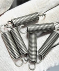 Heavy Duty Stainless Steel Tension Springs With Hooks 10 Piece Pack 10MM By 1.5MM Wire Size 45MM Length on hand for automotive use.