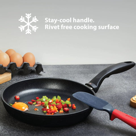 9.5 Inch Diamond Coated Nonstick Fry Pan Induction Ready Aluminum Skillet Oven Safe, cooking vegetables and eggs on countertop.