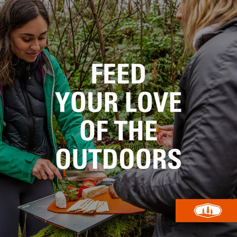 People using Compact 6-Piece Camping Knife Set With Santoku, Paring Knife in an outdoor setting