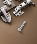 Ten Pack Stainless Steel Flat Head Socket Screws 5/16-18 X 2 on brown surface, next to silver hardware pieces