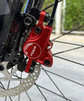 Sick Stopping Power Hydraulic Disc Brake Set For Mountain Bikes Includes Dual 160mm Rotors Long Oil Lines And Front Rear Levers detail of red brake caliper and rotor