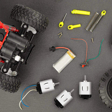 Twenty Pieces Micro DC Motors 1.5V to 3V 23000 RPM for DIY Toys and Science Projects displayed with car parts and tools.