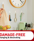 Kettle and utensils on wall with 5 Pound Large Utility Hooks Kit With 14 Hangers And 16 Adhesive Strips Damage Free Wall Mounts