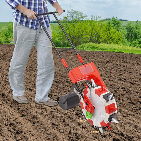 Man using Metal Precision Garden Seeder With 6 Nozzles Walk Behind Row Crop Planter on field