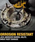 DEWALT Impact Connect PVC pipe cutter with diamond grit wheel shown inside a corroded metal pipe flange
