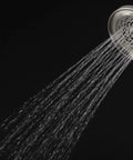Kubos Exhilaration High Pressure Handheld Shower Head Matte Black Finish, 2 GPM, water flowing from modern round showerhead
