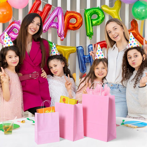 Group at party with 32 Piece Gift Bags Set With 32 Tissues Eight Color Rainbow Party Favors With Handles For Wedding Birthday Parties And Gifts