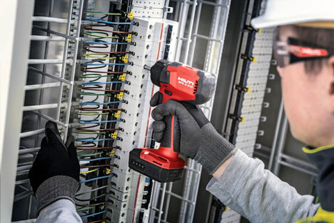 Technician using Battery Pack B 12/2.6 for Cordless Systems 10.8V Replacement Power Pack for Tools in electrical setup