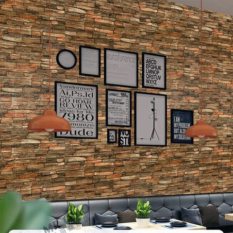 Peel and Stick 3D Faux Brick Wall Panels, Self Adhesive Foam Wallpaper, Antique Look, used as a living room backdrop with frames.