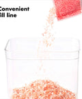 Pouring salt into 0.4L Airtight Herb Storage Container For Spices And Pantry Staples, Stackable No Fuss Space Saving Design Keeps Dried Herbs Fresh, Clear Lid For Easy Visibility