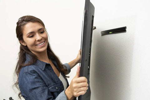 No Stud TV Wall Mount For 26 To 55 Inch Flat Screens With Built In Level Quick 10 Minute Install Will Not Damage Walls No Anchors Needed shown.