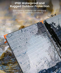 450W Portable Foldable Solar Panel Charger For Off Grid RV Power Backup IP68 Waterproof showing water resistance on rocky ground